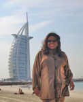 Jackie Sunshine Smith at Dubai Burj Al Arab Hotel beachfront.jpg