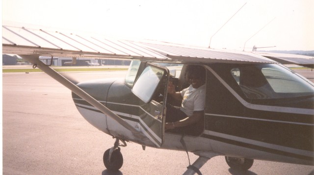 Jackie Smith at Atlanta OBAP ACE Camp preparing to take off from Charlie Brown Airport.jpg