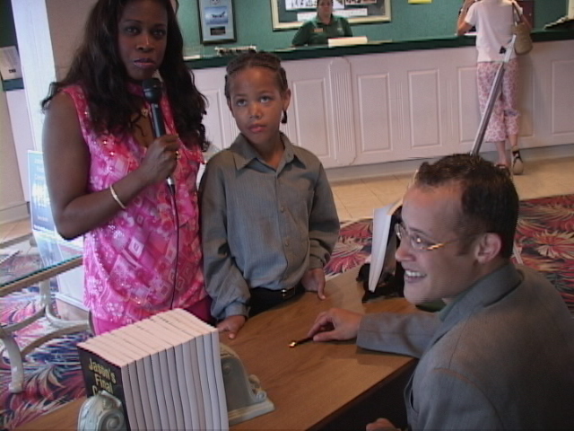 Jackie Smith with author & brother Terry Smith, and actor & nephew Trae Smith.jpg