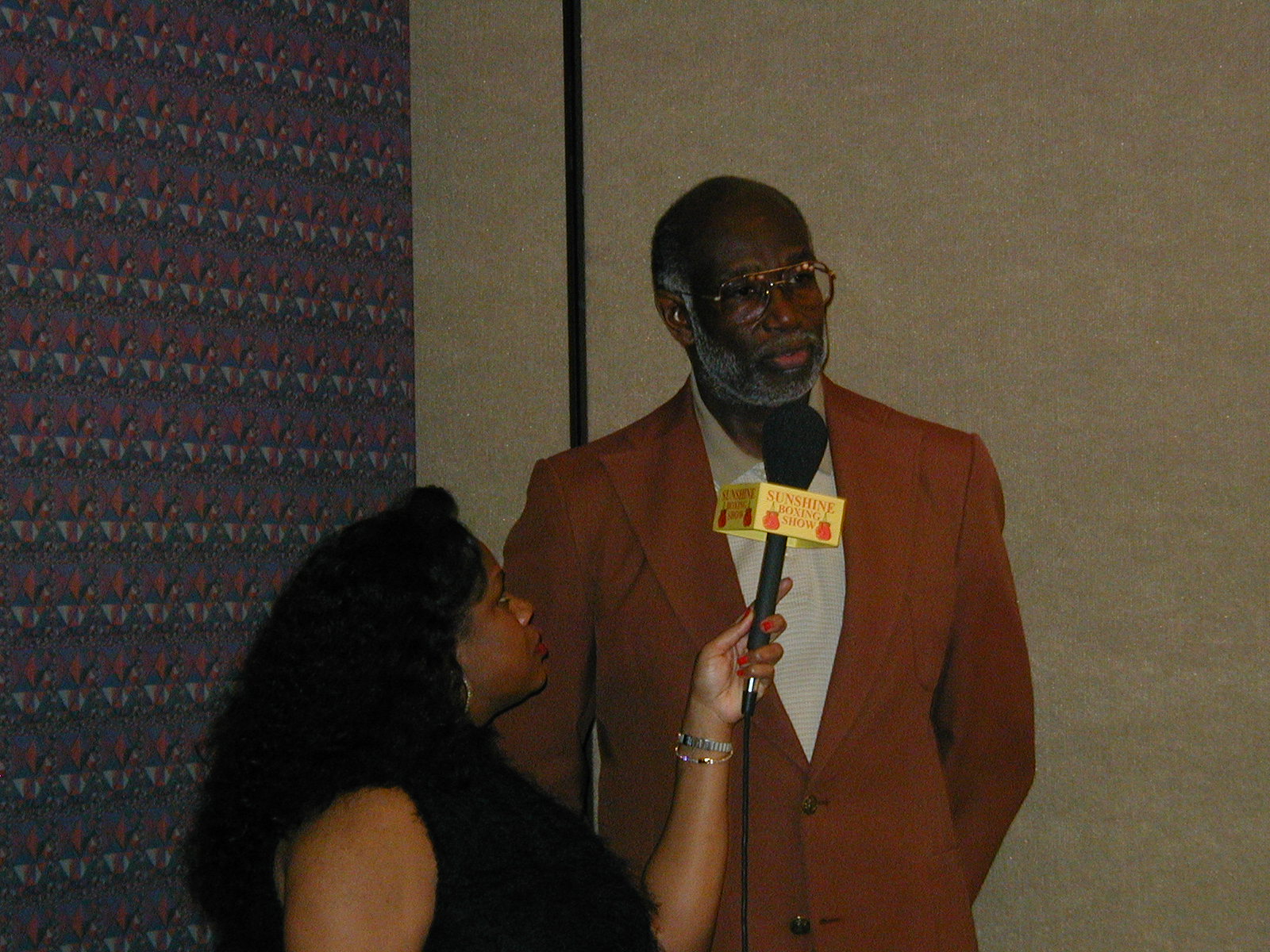 Jackie Smith interviews NBA Hall of Famer Walt Bellamy at Celebrity Fight Night Atlanta.jpg