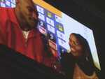 Evander Holyfield and Jackie Sunshine Smith on jumbotrons at Holyfield vs Valuev.JPG