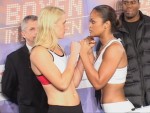 Ali and Sandell stare down at weighin.JPG
