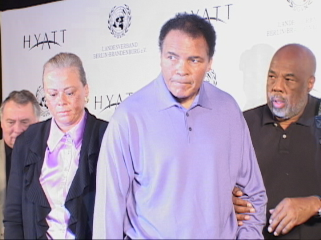 Lonnie and Muhammad Ali with Howard Bingham at UN Press conf in Berlin.jpG