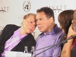 Mr and Mrs Muhammad Ali confer at UN Press Conf in Berlin.JPG