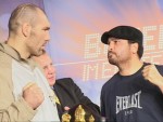 Nikolai Valuev and WBA Champ John Ruiz face off at Berlin weighin.jpG