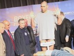 Nikolai Valuev weighs in at 7 ft 2 in 323 pounds in Berlin.jpg